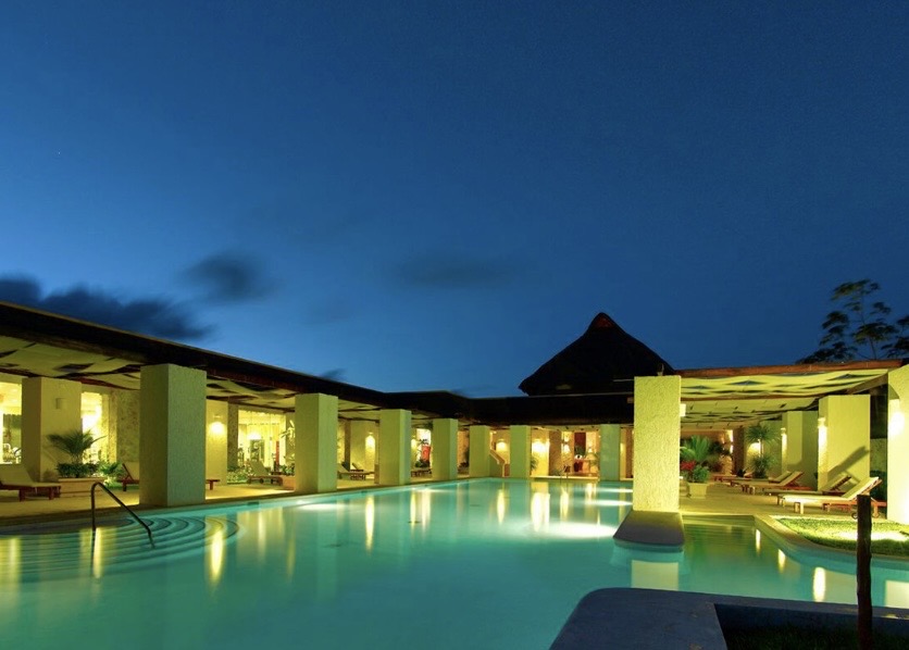 Evening by the lantern-lit pool